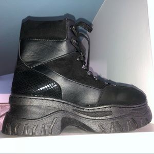 Lightly used bamboo platform combat boots